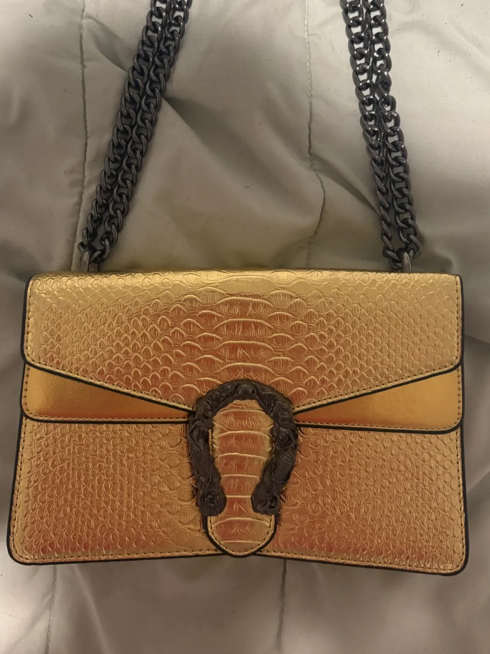 Metallic Gold Textured Shoulder Bag with Decorative Clasp